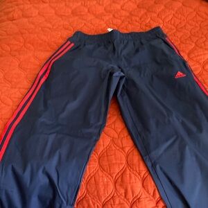 Adidas men Dark Blue Joggers with red stripes small size
